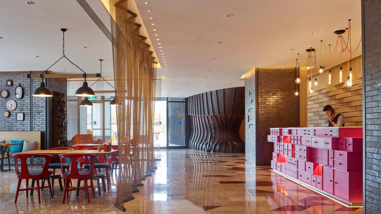 Hotel Indigo Kaohsiung Central Park, an IHG Hotel Bagian luar foto Lobby